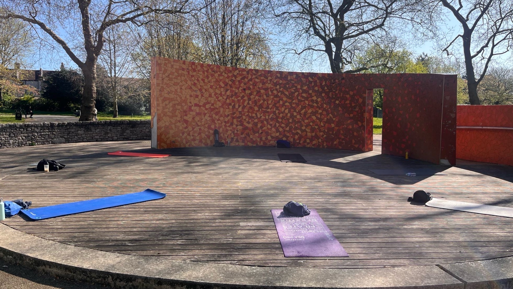 Outdoor fitness equipment and exercise mats laid out for a personal training session at Stratford Park East London